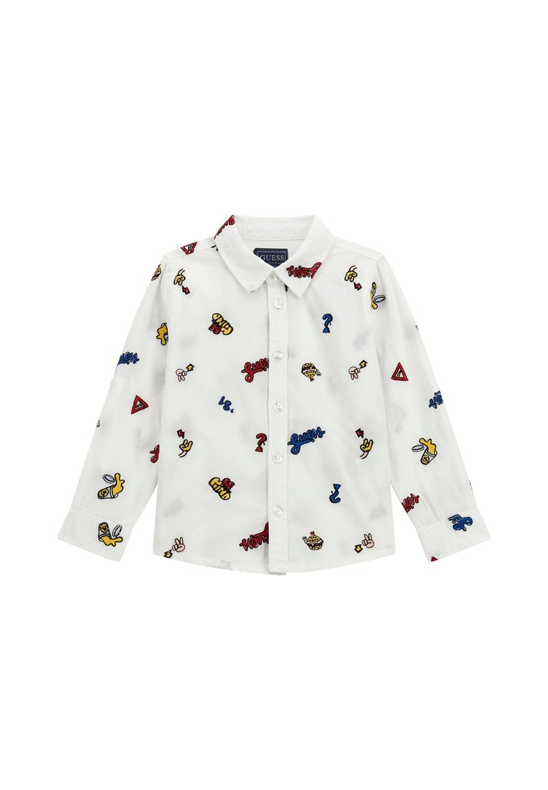 Camicia bianca a maniche lunghe con motivi ricamati colorati, inclusi punti interrogativi, frasi e simboli giocosi. Presenta un colletto classico e bottoni.