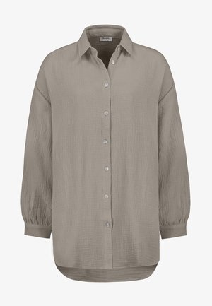 Long-sleeve, button-up shirt in light taupe, featuring a textured fabric, a classic collar, and a curved hemline with slight gathers at the cuffs.