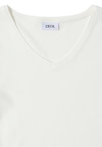 Biała koszulka typu v-neck z miękkiego materiału. Posiada metkę z logo "CECIL" przy dekolcie oraz gładką fakturę. Prosty i minimalistyczny design.