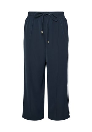 Marineblaue, verkürzte Hosen aus weichem Stoff mit einem Kordelzugbund und weißen Seitenstreifen als Detail. Glatte Textur mit einem lässigen Schnitt.