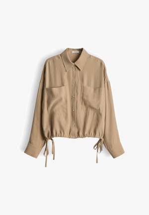Beige Hemd mit langen Ärmeln, zum Knöpfen, mit zwei Fronttaschen und verstellbaren Kordeln am Saum, ausgestattet mit einem klassischen Kragen.