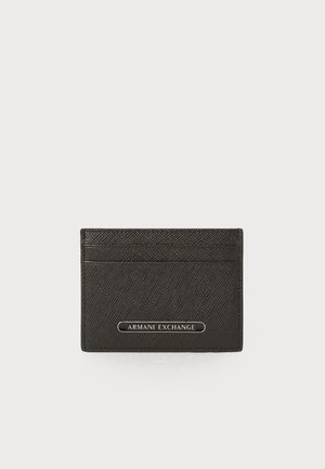 Black cardholder with a textured surface and silver "Armani Exchange" logo at the center, showcasing a sleek, minimalist design.