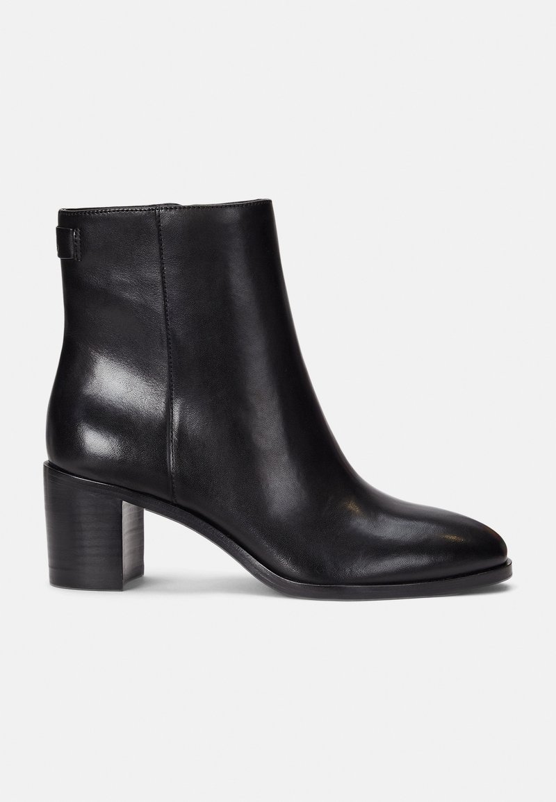 Black leather ankle boot with a smooth finish, rounded toe, and a mid-height block heel. Features minimal stitching and a loop at the back.