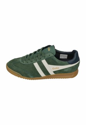 Green suede sneaker with white side stripes, gum sole, lace-up design, navy heel, and gold "Gola" branding on the side and tongue.
