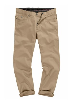 Chinos beige in cotone con chiusura a zip e bottone, dotati di tasche frontali e posteriori, orli arrotolati e una fodera nera nella vita interna.