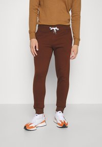 Pier One 2 PACK - Tracksuit bottoms - dark brown/black