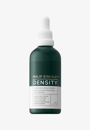 Grüne Flasche mit einem weißen Tropfverschluss, beschriftet mit "Dichte", enthält erhaltene Kopfhaut-Tropfen. Der Text umfasst die Produktvorteile und das Volumen. 85ml.