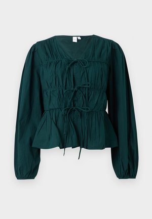Donkergroen blouse met lange mouwen, voorzien van geplooide stof en drie strikjes aan de voorkant, met een peplumzoom en elastische manchetten.