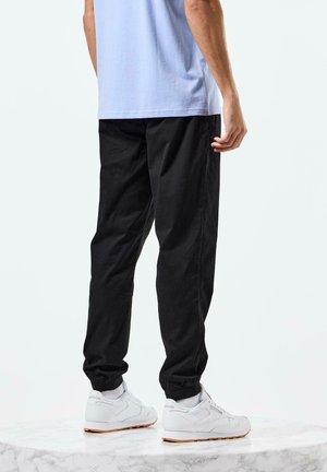 BORDETA - Cargo trousers - black