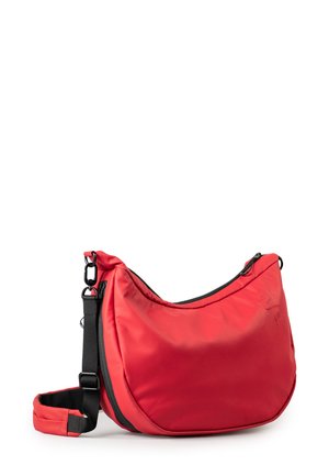 Red nylon shoulder bag with a curved design, adjustable strap, and black zipper accents. Smooth texture with minimal branding detail.