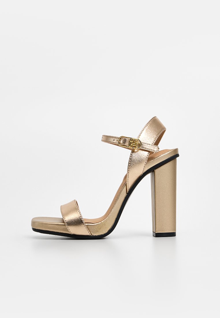 Tommy Hilfiger Sandalen met plateauzool goudkleurig