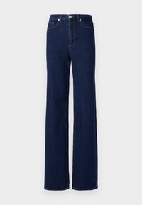 Mørkeblå denimbukser med høy midje, vide ben og klassisk fem-lommer design. Avsluttet med kontrasterende søm og en metallknapp.