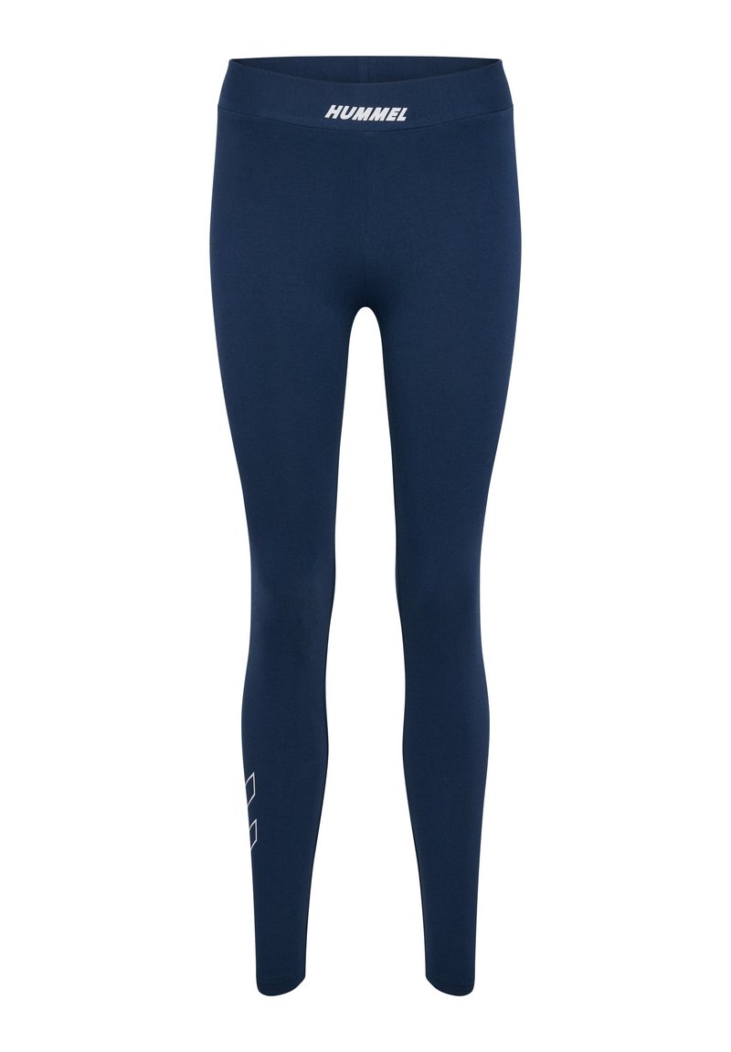 Leggings azul marino hechos de una tela elástica, con una cinturilla ancha que lleva el logo "HUMMEL" y un patrón geométrico blanco en la parte inferior.