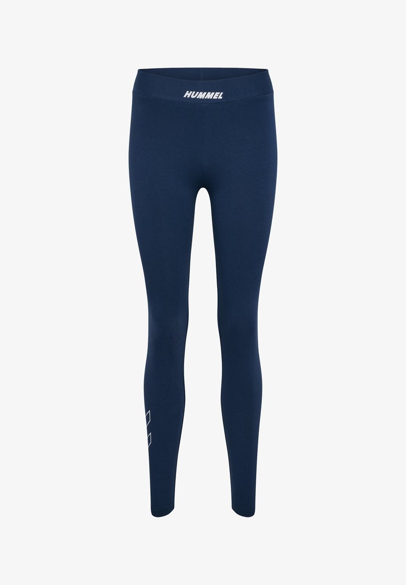Leggings azul marino hechos de una tela elástica, con una cinturilla ancha que lleva el logo "HUMMEL" y un patrón geométrico blanco en la parte inferior.