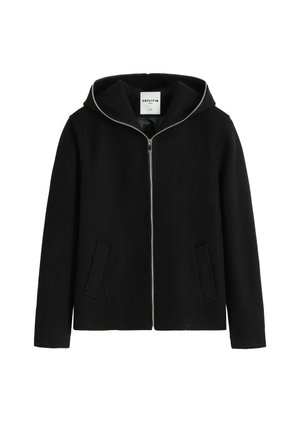 Veste à capuche noire en tissu doux, avec fermeture à glissière à l'avant, deux poches latérales et un design minimaliste. Texture lisse sur l'ensemble.
