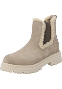 Beige suède enkellaars met een fluffy crèmekleurige kraag, elastische zijpanelen en een dikke, gestructureerde crèmekleurige zool voor grip.