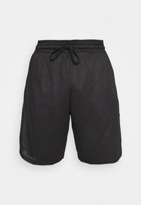 Black mesh shorts with a textured, breathable fabric. Features an elastic waistband with a drawstring and a small purple logo accent.