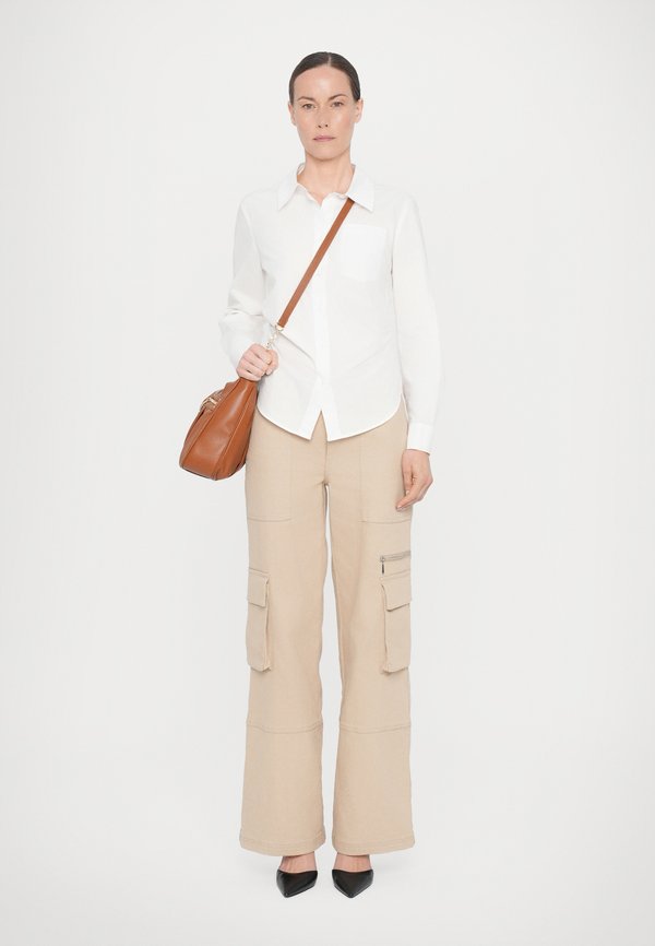 BAGGY - Cross body bag - camel