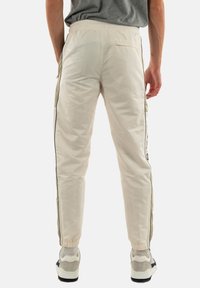 Sergio Tacchini Pantalones deportivos - beige
