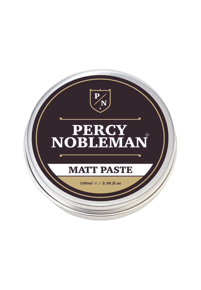 Ronde zilveren blik met een zwart en gouden label. De tekst luidt "Percy Nobleman Matt Paste" en geeft een volume aan van 100ml.