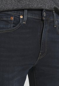 Levi's® 512® SLIM TAPER - Calças de ganga justas - shake the boat