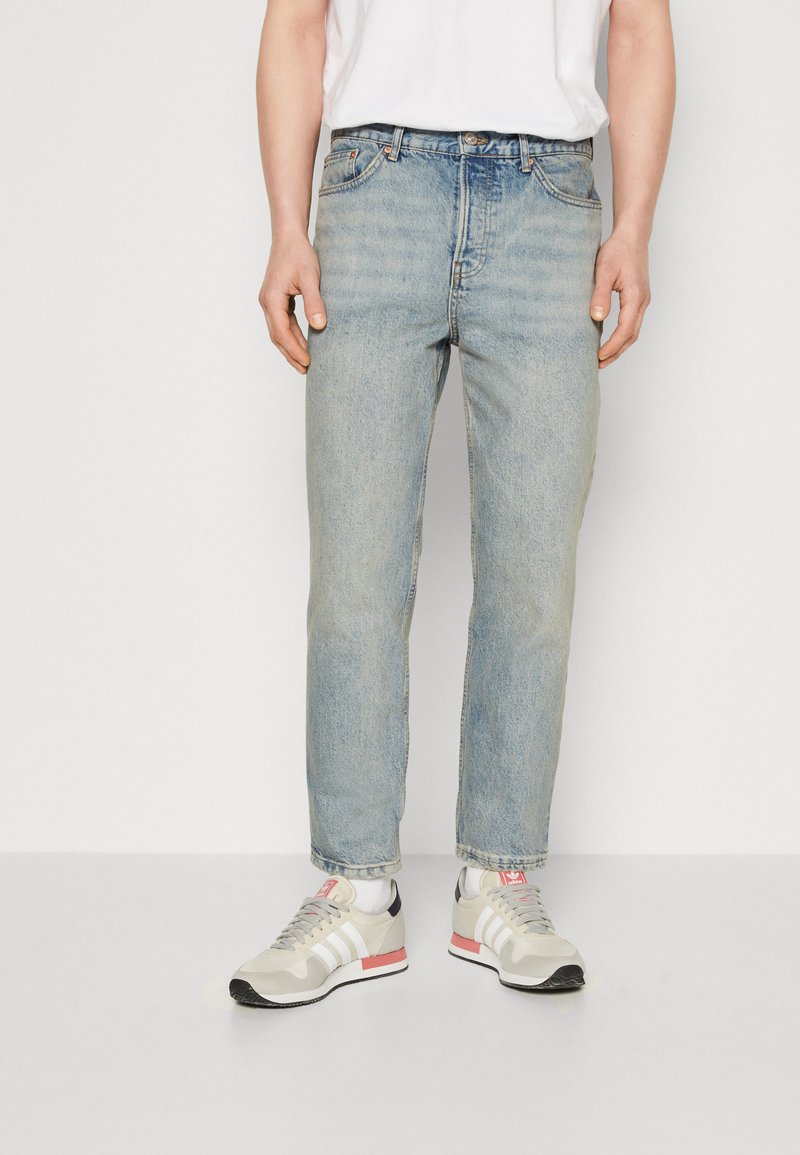 BDG Urban Outfitters DAD Jeans Tapered Fit light denim/blau