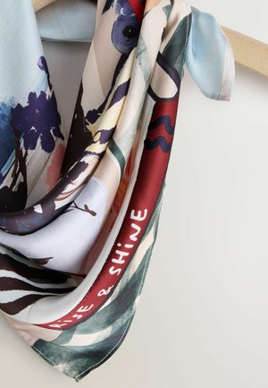Silk scarf featuring a floral and abstract design. Predominantly pastel colors with green, purple, and red accents. Includes text reading "Rise & Shine."