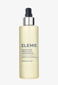 Olej do mycia Nourishing Omega-Rich od Elemis w przezroczystej, jasnopomarańczowej butelce z srebrną pompką, oznaczony jako produkt odżywiający skórę.