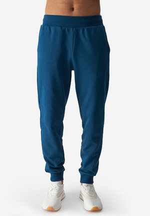 - Spodnie treningowe