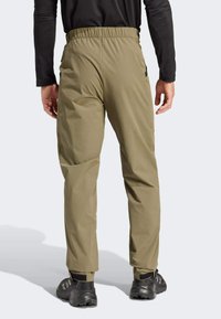 Adidas Terrex XPERIOR - Hlače za otvoreno - olive strata
