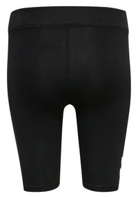 Zwarte aansluitende shorts tot op de knie met een brede tailleband en zichtbare stiksels in het midden van de achterkant.