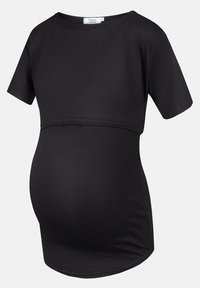 Black maternity top made of soft fabric, featuring short sleeves, a cropped design, and a curved hemline to accommodate a growing belly.