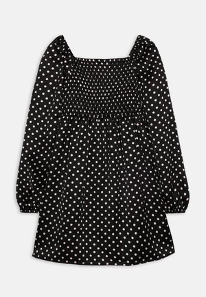 Abito nero con maniche lunghe a sbuffo e scollo quadrato. Presenta un corpetto arricciato e una gonna svasata, decorata con pois bianchi.