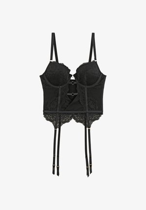 Lingerie corset en dentelle noire avec bonnets à armatures, bretelles réglables, découpe frontale et quatre jarretelles attachées.