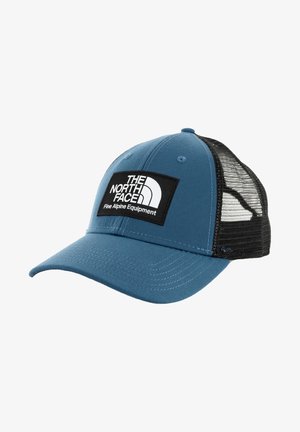 Căciulă de baseball albastră cu fața solidă și spatele din plasă neagră, având un patch alb cu logo-ul "The North Face" și "Fine Alpine Equipment."