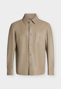 Sélectionné, medium beige