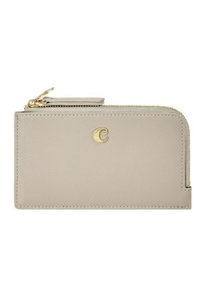 Beige Leder-Geldbörse mit Rundum-Reißverschluss, goldenem Reißverschluss und kleinem goldenem "C"-Emblem auf der Vorderseite, rechteckige Form mit glatter Textur.