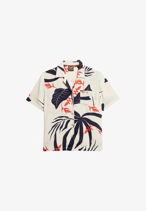 Camisa de manga corta con botones en tela color crema con grandes patrones de hojas tropicales en azul marino y rojo. Cuenta con un bolsillo parche y cuello con muesca.