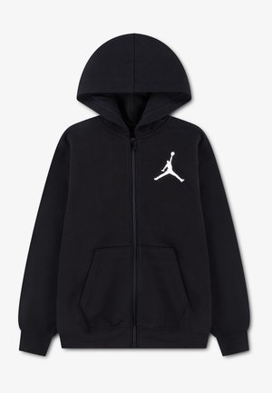 Sweat à capuche zippé noir avec poches avant, capuche et logo blanc Jumpman de basket sur la poitrine gauche.