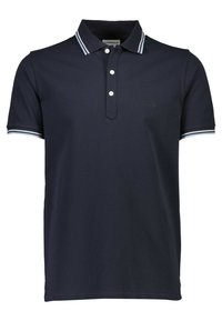 Polo shirt navy avec un plastron à trois boutons, en coton texturé, et avec des accents à rayures sur le col et les manches.