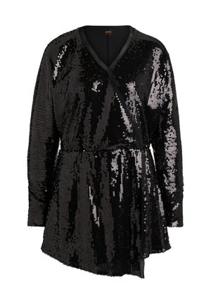 Haut noir à paillettes avec des manches longues, décolleté en V et design enveloppant. Présente une taille ajustée et un ourlet drapé pour une silhouette structurée.