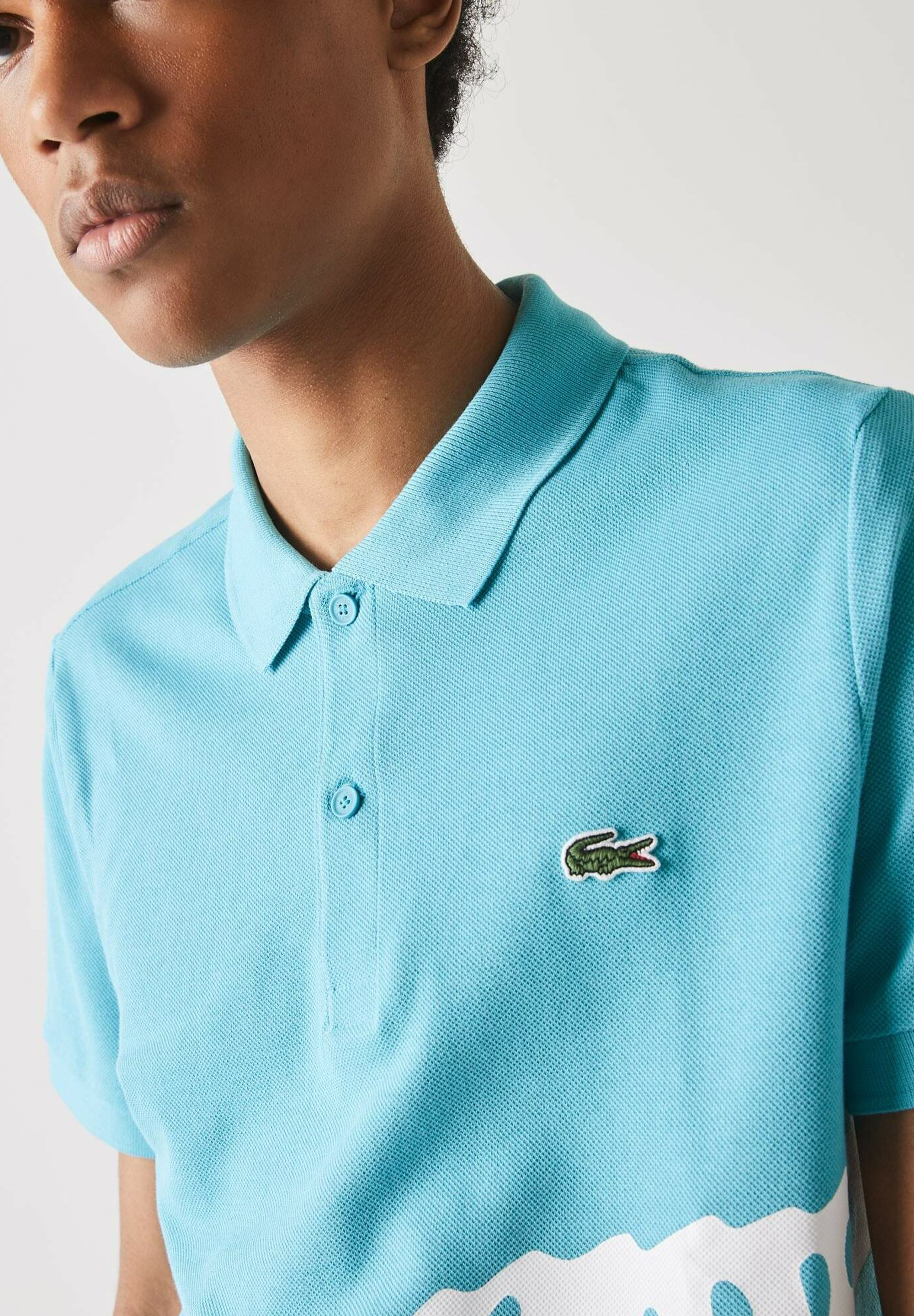 lacoste polo turquoise