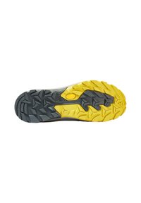 Suola Vibram caratterizzata da una combinazione di colori nero e giallo, texturizzata con tasselli aggressivi per trazione e stabilità su diverse superfici.