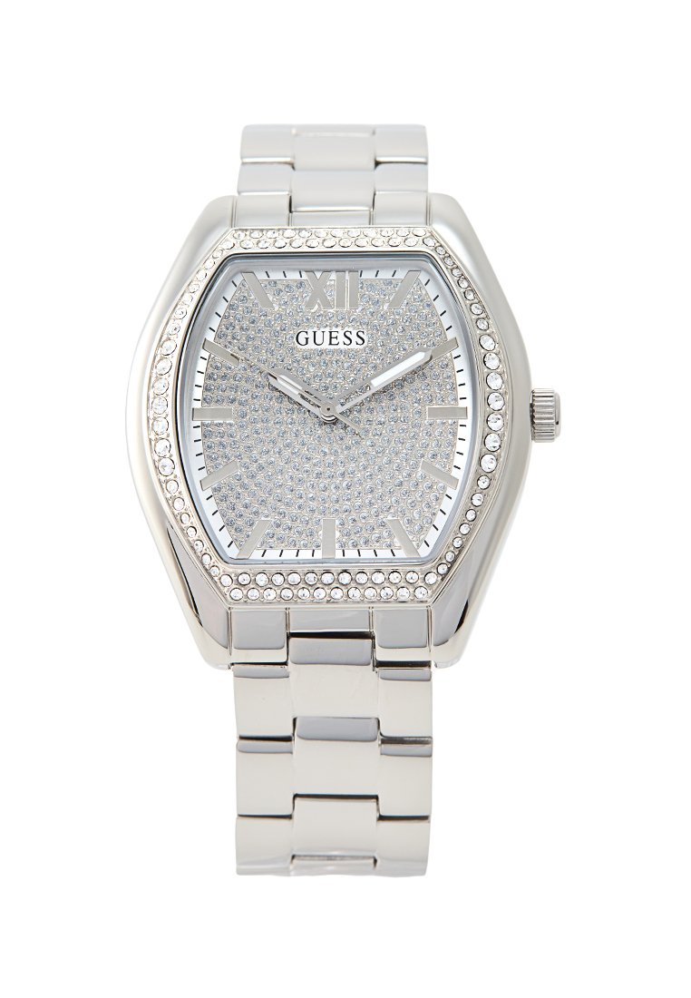 Reloj octogonal plateado con una esfera adornada con cristales, marcadores de números romanos y una pulsera de metal unida. Brillo y detalles notables.