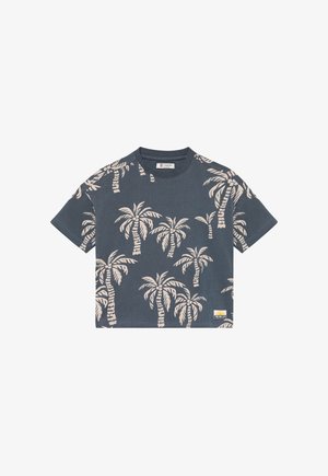 T-shirt corta color navy in cotone morbido con motivo di palme crema. Presenta collo rotondo e piccola etichetta sul fondo a sinistra.