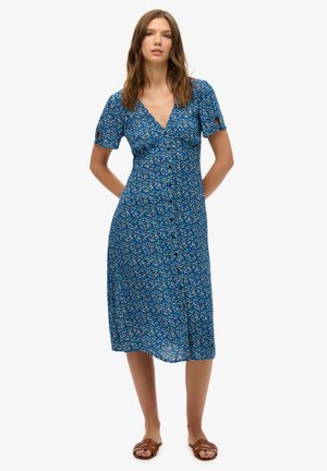 Blaues Blumenhemdkleid mit kurzen Puffärmeln und Ausschnitten; leichtes Material; knielang mit tailliertem Oberteil und ausgestellt Rock.