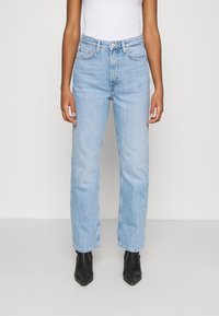 Weekday ROWE EXTRA HIGH - Calças de ganga de perna direita - light blue moise