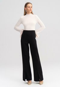 Touché Privé SLIT DETAILED - Hlače - black