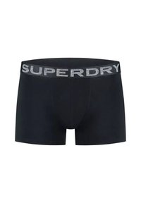 Boxer neri realizzati in un materiale liscio, con un elastico grigio in vita su cui è stampato "SUPERDRY".
