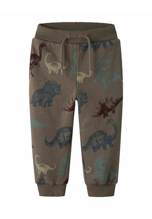 Braune Kleinkinderhose mit geripptem Bund und Bündchen, verziert mit blauen, grünen und braunen Dinosaurier-Prints und einem vorderen Kordelzug.